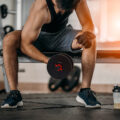 Bodybuilder,Working,Out,With,Dumbbell,Weights,At,The,Gym.man,Bodybuilder