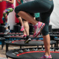 Mini,Trampoline,Workout:,Girl,Doing,Fitness,Exercise,In,Class,At